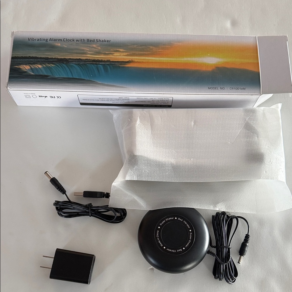 Vibrating alarm clock with bed shaker. Brand new in box, never used